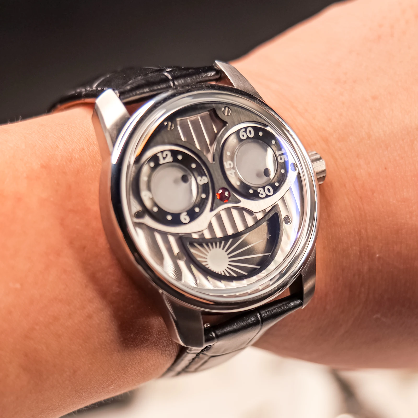 Luxury skeletal watch displaying celestial mechanics and intricate movement