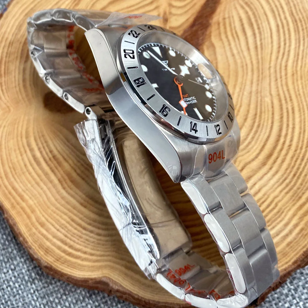 Explorer GMT watch with highly legible dial design featuring distinct hour markers and contrasting 24-hour hand